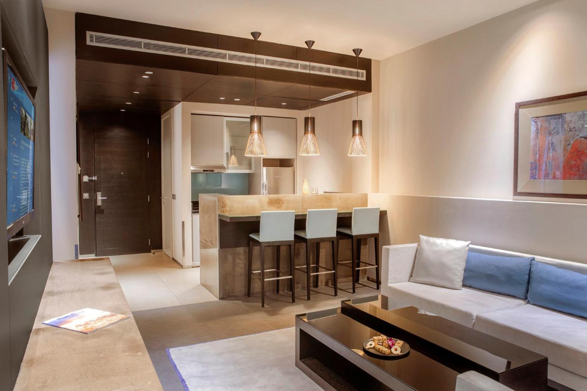 The Abdali Boulevard Hotel Amman Zewnętrze zdjęcie A living room with a kitchenette